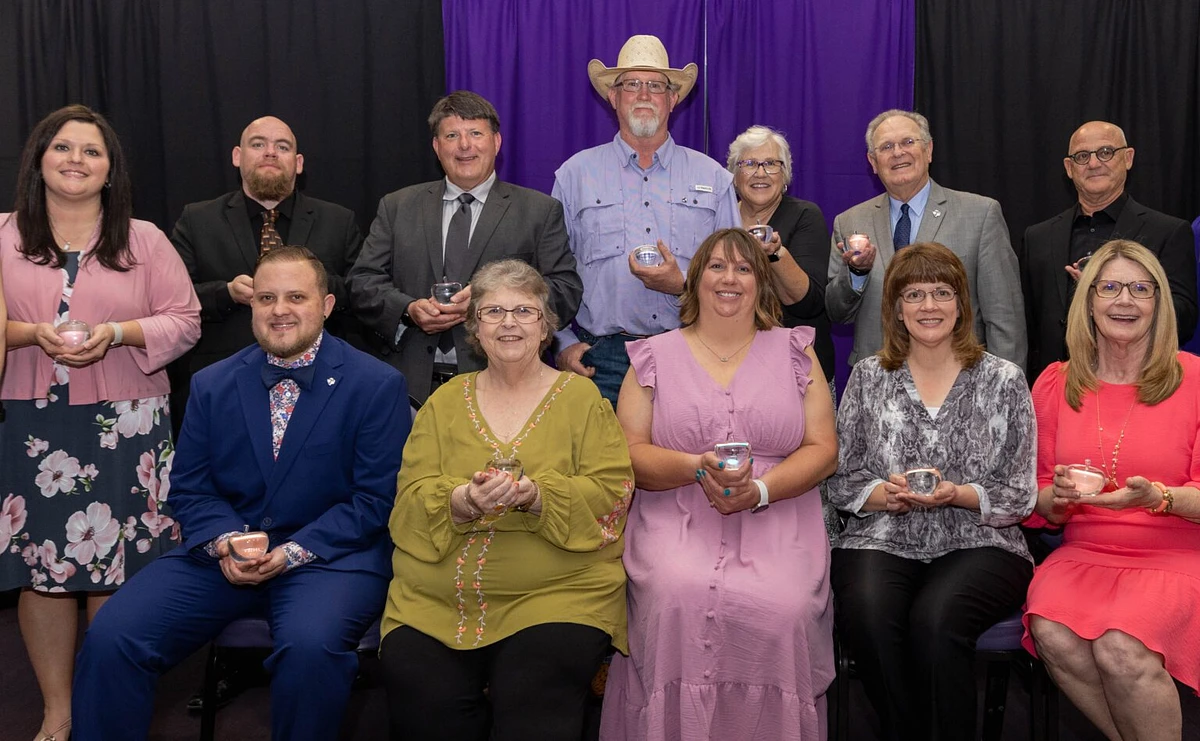 Tarleton recognized a dozen area educators with induction into the Crystal Apple Society at a recent campus ceremony. They are, top row from left, Jody Fain, Mr. Michel Wimberly, Kevin Ferguson, Bret Barrick, Diane Pokluda, Dr. Russ Higham, and Phil Glauben. Bottom row from left, Dr. Beck Munsey, Dalta Ann Coulter, Monica Barrick, Dr. Beth Riggs, and Debby Hopkins-Higham.